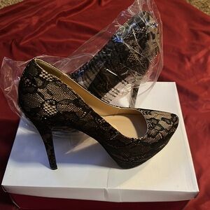 Never been worn Lace Heels.